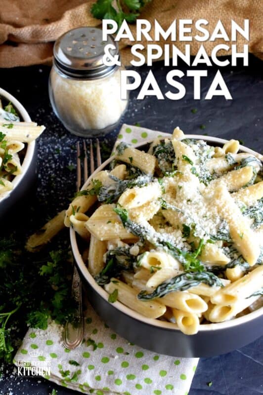 Parmesan and Spinach Penne Pasta is the ultimate dream for those of us who love creamy pasta dishes! Loaded with parmesan and heavy cream, this pasta is a delightful, non-apologetic dish that provides so much comfort food happiness. Let's just say the healthy spinach balances out the calorie-heavy ingredients! #parmesan #spinach #creamy #vegetarian #penne