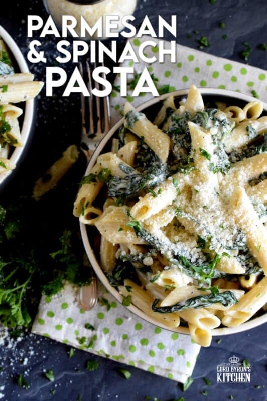 Parmesan and Spinach Penne Pasta is the ultimate dream for those of us who love creamy pasta dishes! Loaded with parmesan and heavy cream, this pasta is a delightful, non-apologetic dish that provides so much comfort food happiness. Let's just say the healthy spinach balances out the calorie-heavy ingredients! #parmesan #spinach #creamy #vegetarian #penne