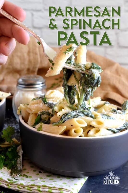 Parmesan and Spinach Penne Pasta is the ultimate dream for those of us who love creamy pasta dishes! Loaded with parmesan and heavy cream, this pasta is a delightful, non-apologetic dish that provides so much comfort food happiness. Let's just say the healthy spinach balances out the calorie-heavy ingredients! #parmesan #spinach #creamy #vegetarian #penne