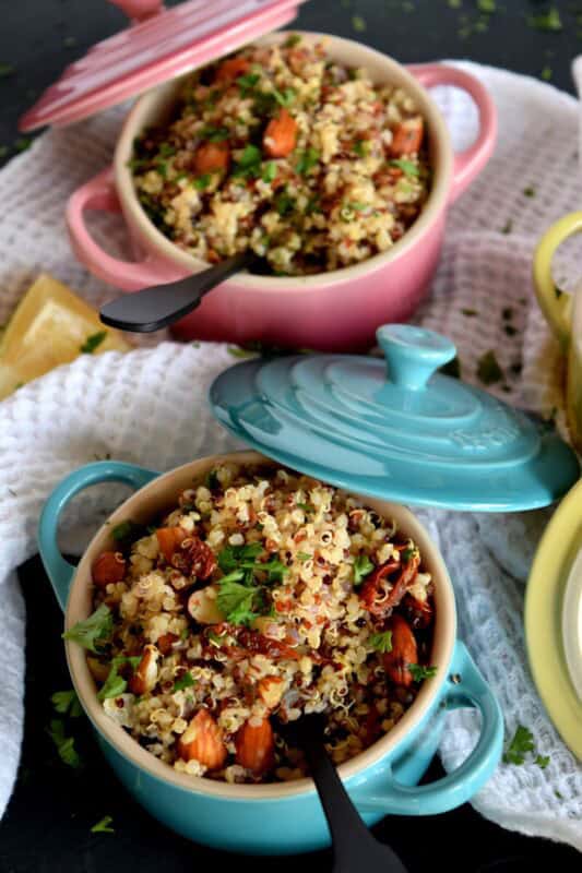 A light and refreshing salad prepared with healthy pantry ingredients, this Sun Dried Tomato and Almond Quinoa Salad is delightfully easy to make and a great way to use up any leftover quinoa! #quinoa #almonds #salad #tomato #sundried