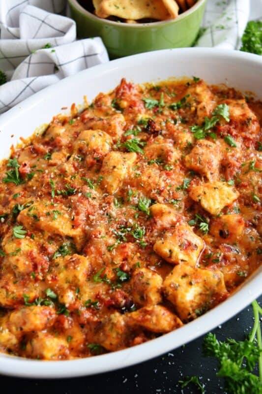 There is no doubt that this Roasted Red Pepper Cheese Dip will quickly become your favourite dip of all time! Its smokey, nutty flavour and its gooey, creamy texture are oh, so delicious! Prepared with four different cheeses, this dip is a flavour explosion! #redpepper #smokey #cheesy #dip #4cheese #baked #hot