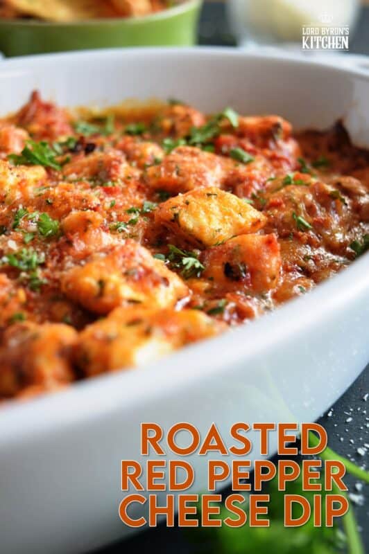 There is no doubt that this Roasted Red Pepper Cheese Dip will quickly become your favourite dip of all time! Its smokey, nutty flavour and its gooey, creamy texture are oh, so delicious! Prepared with four different cheeses, this dip is a flavour explosion! #redpepper #smokey #cheesy #dip #4cheese #baked #hot