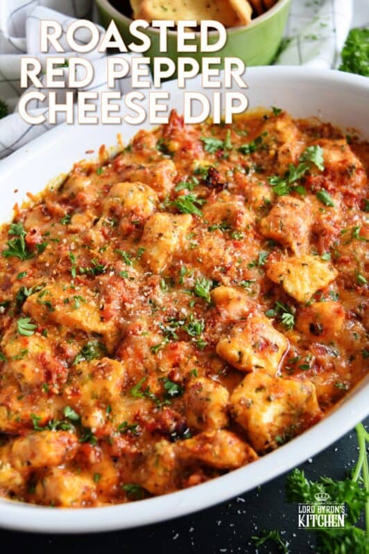 There is no doubt that this Roasted Red Pepper Cheese Dip will quickly become your favourite dip of all time! Its smokey, nutty flavour and its gooey, creamy texture are oh, so delicious! Prepared with four different cheeses, this dip is a flavour explosion! #redpepper #smokey #cheesy #dip #4cheese #baked #hot