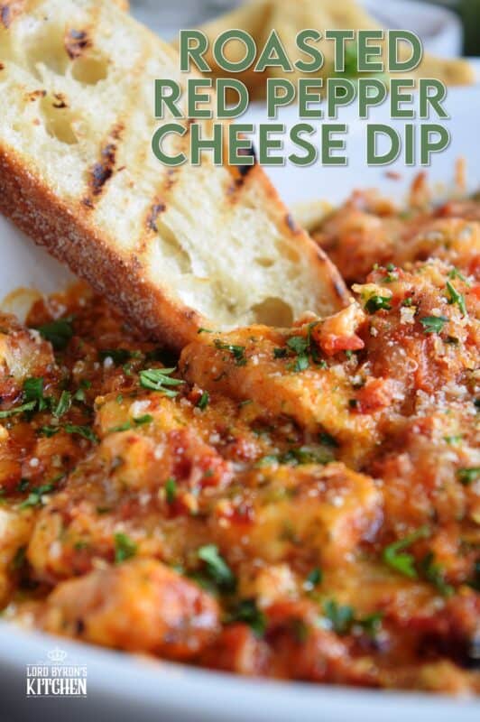 There is no doubt that this Roasted Red Pepper Cheese Dip will quickly become your favourite dip of all time! Its smokey, nutty flavour and its gooey, creamy texture are oh, so delicious! Prepared with four different cheeses, this dip is a flavour explosion! #redpepper #smokey #cheesy #dip #4cheese #baked #hot