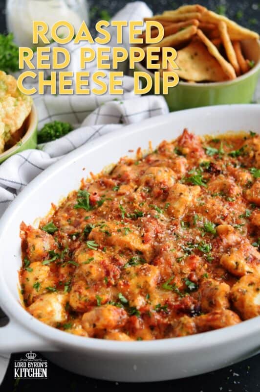 There is no doubt that this Roasted Red Pepper Cheese Dip will quickly become your favourite dip of all time! Its smokey, nutty flavour and its gooey, creamy texture are oh, so delicious! Prepared with four different cheeses, this dip is a flavour explosion! #redpepper #smokey #cheesy #dip #4cheese #baked #hot