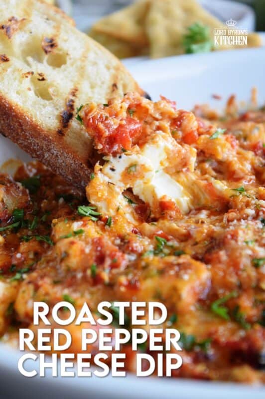 There is no doubt that this Roasted Red Pepper Cheese Dip will quickly become your favourite dip of all time! Its smokey, nutty flavour and its gooey, creamy texture are oh, so delicious! Prepared with four different cheeses, this dip is a flavour explosion! #redpepper #smokey #cheesy #dip #4cheese #baked #hot