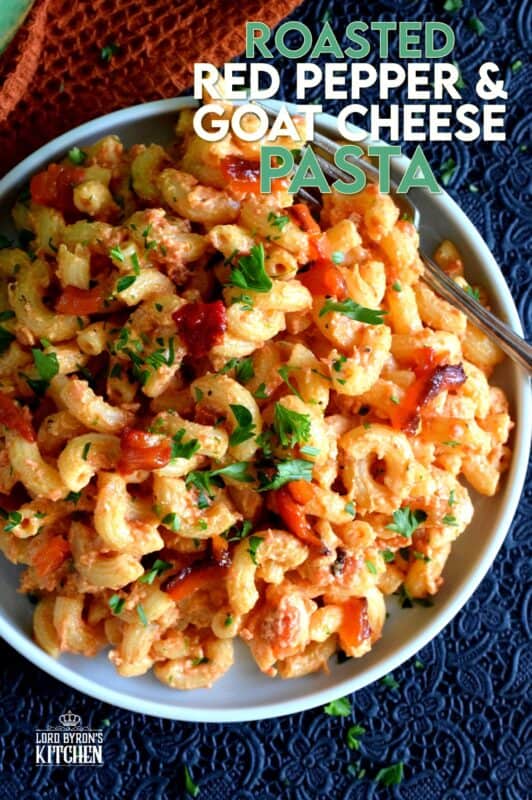 Creamy, smoky, cheesy, and home-style – that’s the essence of Roasted Red Pepper and Goat Cheese Pasta. A weeknight dinner option that never disappoints! Made with a splash of white wine, this rustic pasta can easily pass as a gourmet dinner option for your guests. #goatcheese #whitewine #pasta #roastedredpepper