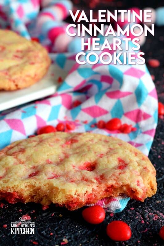Not all great cookies are soft and chewy.  Valentine Cinnamon Heart Cookies are thin and crispy with a soft, sweet center. And, they're packed full of everyone's favourite cinnamon candy! Make a batch for your special someone today! #valentine #cinnamon #heart #candy #cookies
