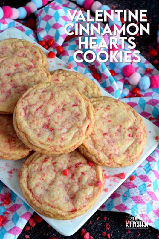 Not all great cookies are soft and chewy.  Valentine Cinnamon Heart Cookies are thin and crispy with a soft, sweet center. And, they're packed full of everyone's favourite cinnamon candy! Make a batch for your special someone today! #valentine #cinnamon #heart #candy #cookies