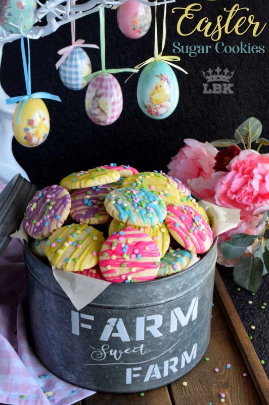Whimsical and playful, Easter Sugar Cookies are a springtime delight! Easy and fun to make, and great for giving as a gift to that favourite teacher or daycare provider!#Easter #cookies #sprinkles #pastel #colours #candy #melts @wilton