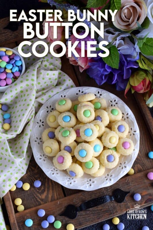 Miniature, one-bite cookies made with pastel candy centers. Easter Bunny Button Cookies are a great Easter gift idea and can be easily packaged for gift-giving, or just save them all for yourself! Whatever you decide, a double batch just might be a good idea! #easter #bunny #cookies #candy #chocolate