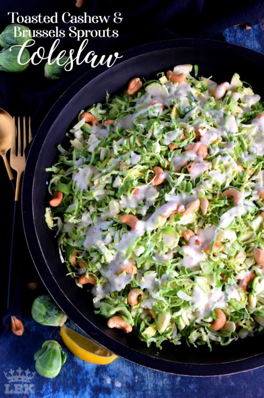 This non-traditional coleslaw consists of uncooked shaved Brussels sprouts which have been tossed with toasted cashews in a homemade tangy and zesty sauce. #brussels #sprouts #coleslaw #salad #raw #toasted #cashews