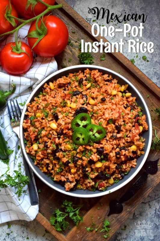 Toss everything into one pot, stir to combine, and let it go. Mexican One Pot Instant Rice is just that easy! It's a fast side dish that's perfect served hot or at room temperature! #mexican #rice #side #dish #vegetarian #instant #burrito #filling