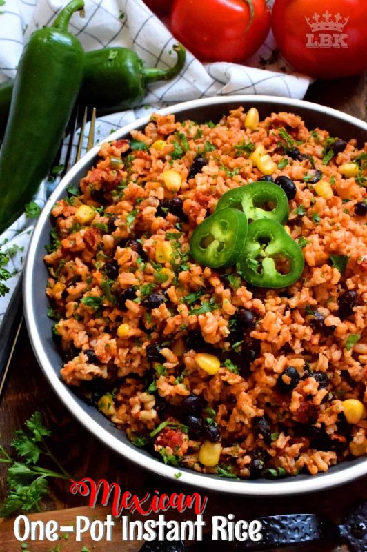Toss everything into one pot, stir to combine, and let it go. Mexican One Pot Instant Rice is just that easy! It's a fast side dish that's perfect served hot or at room temperature! #mexican #rice #side #dish #vegetarian #instant #burrito #filling