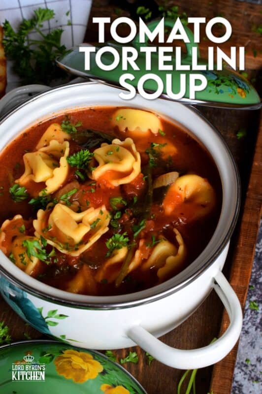 This soup is a complete meal! Not only is it hearty and filling, it's also very delicious! Tomato Tortellini Soup is a wholesome and nutritious meal that is quite easy to prepare and only takes about forty minutes from start to finish! It's loaded with aromatics and fresh spinach too! #soup #pasta #tomato #tortellini