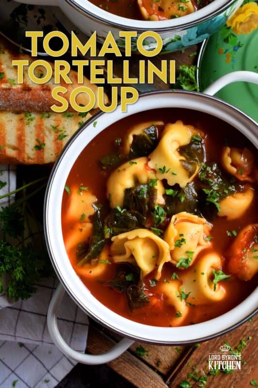 This soup is a complete meal! Not only is it hearty and filling, it's also very delicious! Tomato Tortellini Soup is a wholesome and nutritious meal that is quite easy to prepare and only takes about forty minutes from start to finish! It's loaded with aromatics and fresh spinach too! #soup #pasta #tomato #tortellini