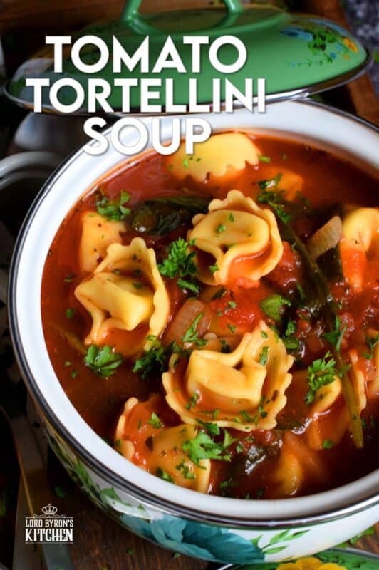 This soup is a complete meal! Not only is it hearty and filling, it's also very delicious! Tomato Tortellini Soup is a wholesome and nutritious meal that is quite easy to prepare and only takes about forty minutes from start to finish! It's loaded with aromatics and fresh spinach too! #soup #pasta #tomato #tortellini