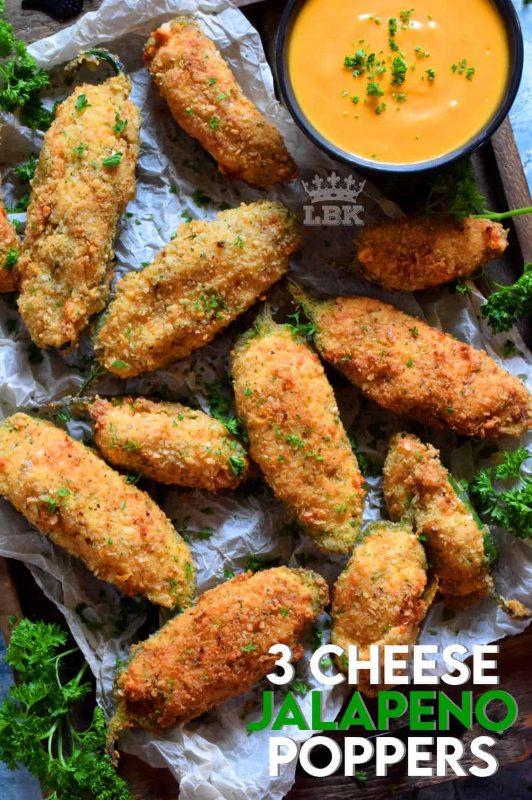 3 Cheese Jalapeno Poppers are stuffed with 3 types of cheese and bold herbs and spices. Next, it's coated in a light breadcrumb mixture, and then deep fried to perfection! #jalapeno #poppers #3cheese #deepfried #crispy #appetizer
