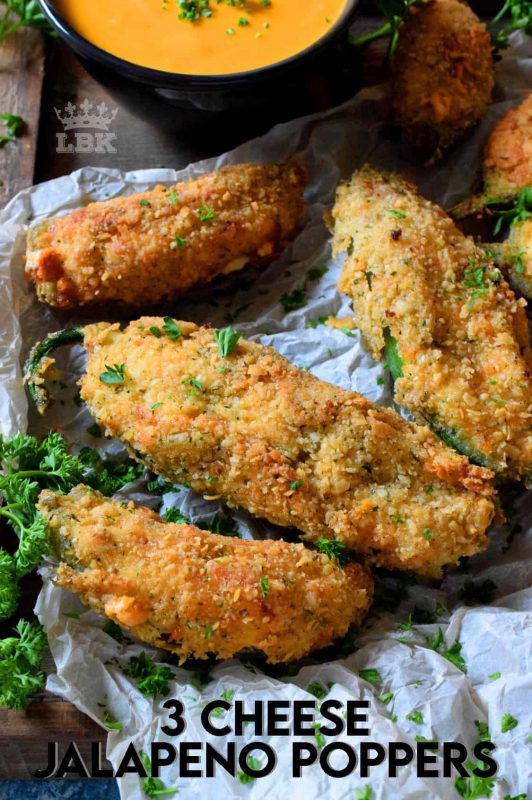 3 Cheese Jalapeno Poppers are stuffed with 3 types of cheese and bold herbs and spices. Next, it's coated in a light breadcrumb mixture, and then deep fried to perfection! #jalapeno #poppers #3cheese #deepfried #crispy #appetizer