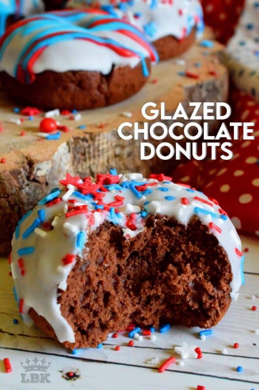 Covered in red, white, and blue frosting and sprinkles, these Glazed Chocolate Donuts scream fourth of July! These will surely be the hit of your family celebrations!#glazed #chocolate #donuts #baked #4thofjuly #sprinkles #patriotic