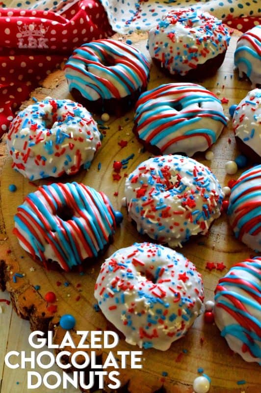 Covered in red, white, and blue frosting and sprinkles, these Glazed Chocolate Donuts scream fourth of July! These will surely be the hit of your family celebrations!#glazed #chocolate #donuts #baked #4thofjuly #sprinkles #patriotic