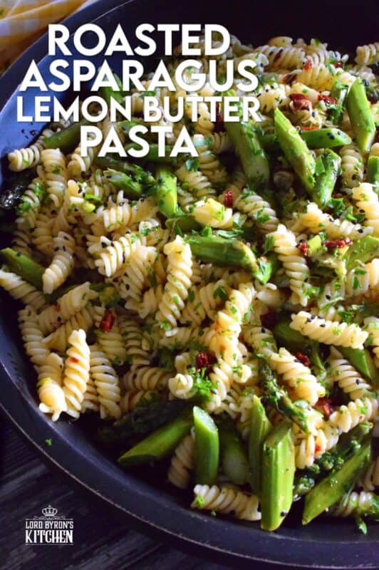 A dish that can only be described as springtime in a bowl, this simple butter roasted asparagus pasta salad, tossed with sun dried tomatoes, fresh lemon, and parmesan. A delightful cold pasta salad that everyone will love! #asparagus #lemon #butter #pasta #salad