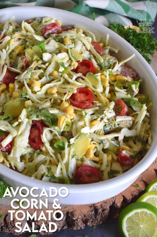 Not every salad needs lettuce or greens to be delicious and healthy. Avocado Corn and Tomato Salad is a perfect example of that! Make this your new favourite summer side dish!#avocado #corn #tomato #salad #cabbage