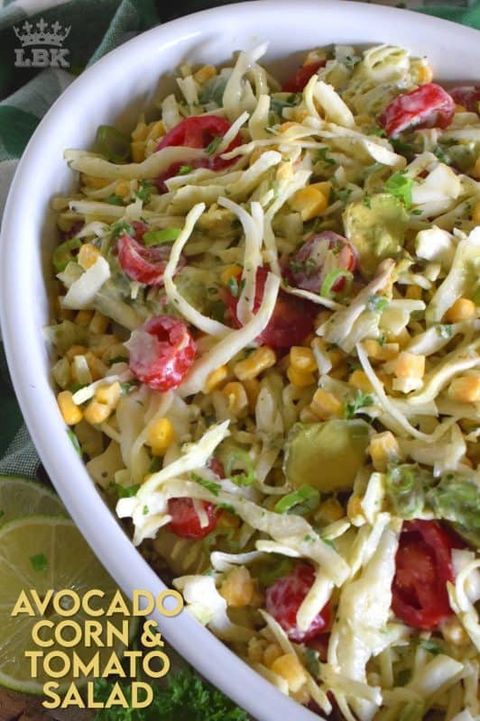 Not every salad needs lettuce or greens to be delicious and healthy. Avocado Corn and Tomato Salad is a perfect example of that! Make this your new favourite summer side dish!#avocado #corn #tomato #salad #cabbage
