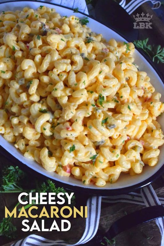 With a few additional ingredients, transform Kraft Dinner or a box of regular Mac & Cheese into a delicious Cheesy Macaroni Salad. This salad is sure to be a very popular side dish at your dinner table!#kraft #dinner #mac&cheese #macaroni #salad #cheesy