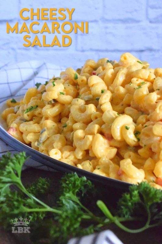 With a few additional ingredients, transform Kraft Dinner or a box of regular Mac & Cheese into a delicious Cheesy Macaroni Salad.  This salad is sure to be a very popular side dish at your dinner table!#kraft #dinner #mac&cheese #macaroni #salad #cheesy