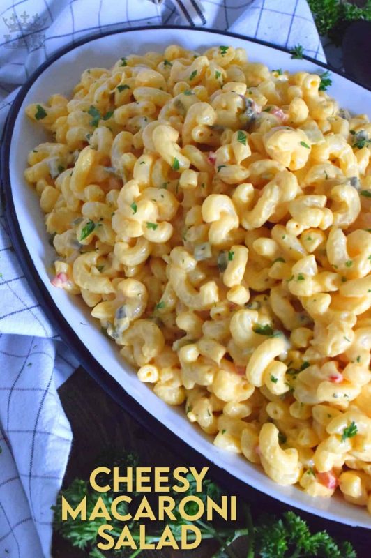 With a few additional ingredients, transform Kraft Dinner or a box of regular Mac & Cheese into a delicious Cheesy Macaroni Salad. This salad is sure to be a very popular side dish at your dinner table!#kraft #dinner #mac&cheese #macaroni #salad #cheesy