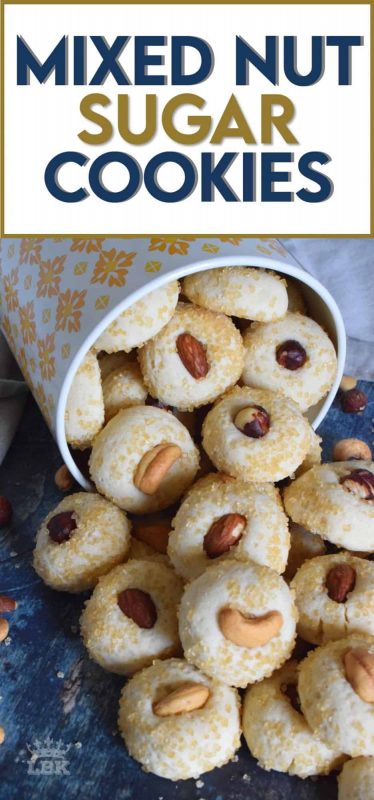 Made with almonds, cashews, and hazelnuts, Mixed Nut Sugar Cookies are a soft, melt-in-your-mouth type of cookie with a crunchy nut baked right on top. Try eating just one! #sugar #cookies #baking #nuts #almonds #cashews #hazelnuts