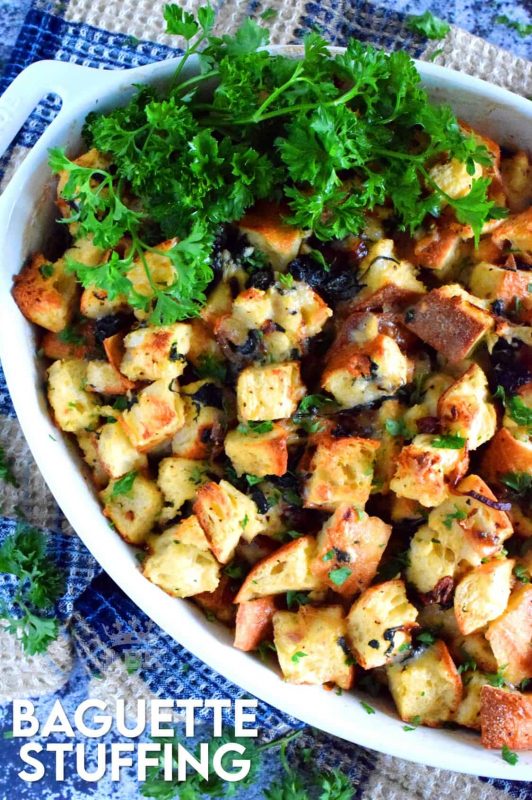 Say good bye to mushy stuffing! Baguette Stuffing with Swiss Chard and Caramelized Onions is chunky, hearty, and vegetarian too! This stuffing is great for any occasion or feast! #stuffing #vegetarian #baked #thanksgiving #meatless