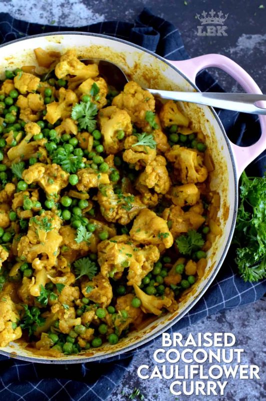 Braising is a food trend that I hope never goes away. But, let's not focus only on tough cuts of meat for braising when we can use great tasting veggies too. Braised Coconut Cauliflower Curry is a wonderful main or side that is warm and inviting and vegetarian too! #cauliflower #braised #curry #indian #food #vegetarian