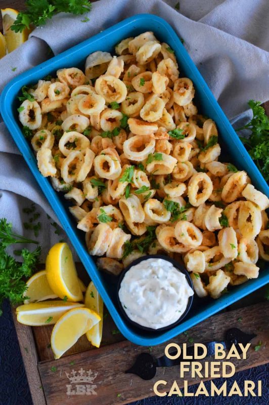Moist and tender Old Bay Fried Calamari is a perfect appetizer or main.  Prepared with pantry ingredients, serve with tartar sauce and lemon wedges for maximum flavour! #calamari #squid #batter #oldbay #fried