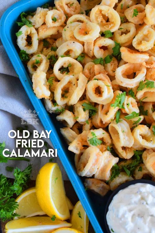 Moist and tender Old Bay Fried Calamari is a perfect appetizer or main. Prepared with pantry ingredients, serve with tartar sauce and lemon wedges for maximum flavour! #calamari #squid #batter #oldbay #fried