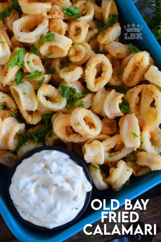 Moist and tender Old Bay Fried Calamari is a perfect appetizer or main. Prepared with pantry ingredients, serve with tartar sauce and lemon wedges for maximum flavour! #calamari #squid #batter #oldbay #fried