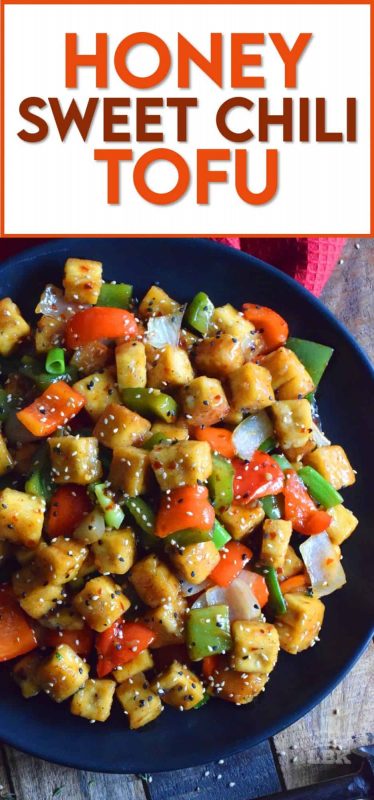 Start with a baked crispy tofu and toss it in a delicious sauce with fresh bell peppers and onions. Honey Sweet Chili Tofu is a robust and satisfying vegetarian main! #tofu #sweetchili #spicy #peppers #vegetarian