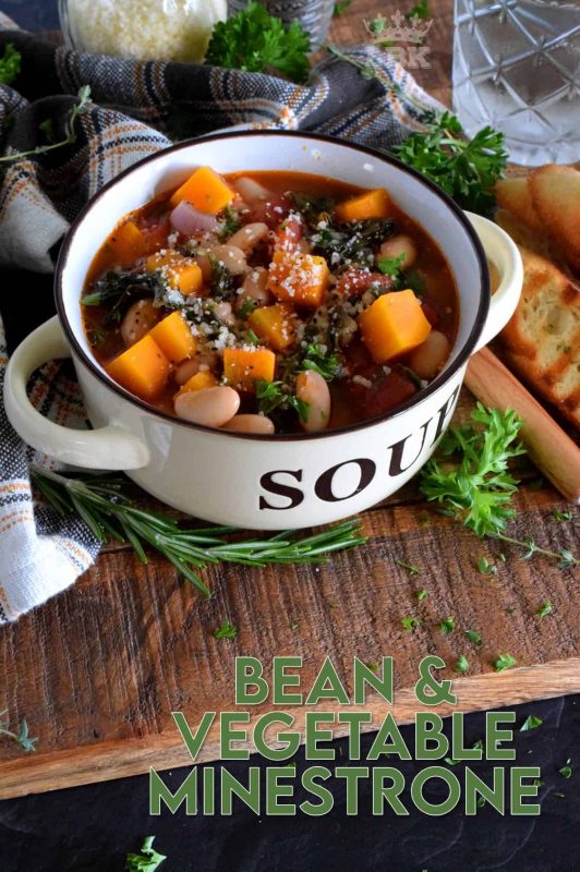 A hearty soup for a cold day, Bean and Vegetable Minestrone is prepared with Swiss chard, tomatoes, white beans, and more. Serve with a sprinkle of parmesan and some grilled bread for a complete meal! #vegetarian #soup #minestrone #beans #coldweather #swisschard