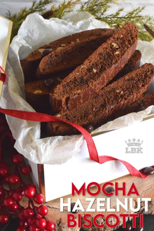 Mocha Hazelnut Biscotti is prepared with deep, rich cocoa, espresso powder, coffee liqueur, chocolate espresso beans, and roasted hazelnuts. This is one very serious biscotti recipe! #biscotti #cookies #mocha #espresso #chocolate #christmas #holiday #baking