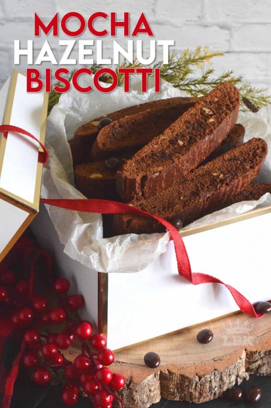Mocha Hazelnut Biscotti is prepared with deep, rich cocoa, espresso powder, coffee liqueur, chocolate espresso beans, and roasted hazelnuts. This is one very serious biscotti recipe! #biscotti #cookies #mocha #espresso #chocolate #christmas #holiday #baking