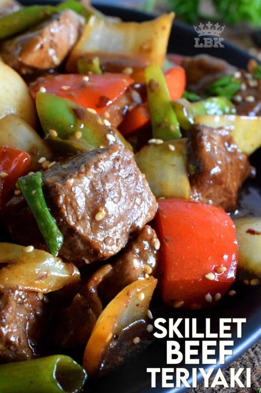 Large pieces of cubed sirloin tip roast is sautéed with peppers, onions, and garlic, in this Skillet Beef Teriyaki dish. Finish with green onions and sesame seeds for quick and easy main! #skillet #beef #sirloin #tip #roast #teriyaki #sesame #sauce