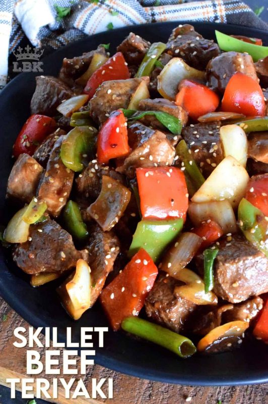 Large pieces of cubed sirloin tip roast is sautéed with peppers, onions, and garlic, in this Skillet Beef Teriyaki dish. Finish with green onions and sesame seeds for quick and easy main! #skillet #beef #sirloin #tip #roast #teriyaki #sesame #sauce