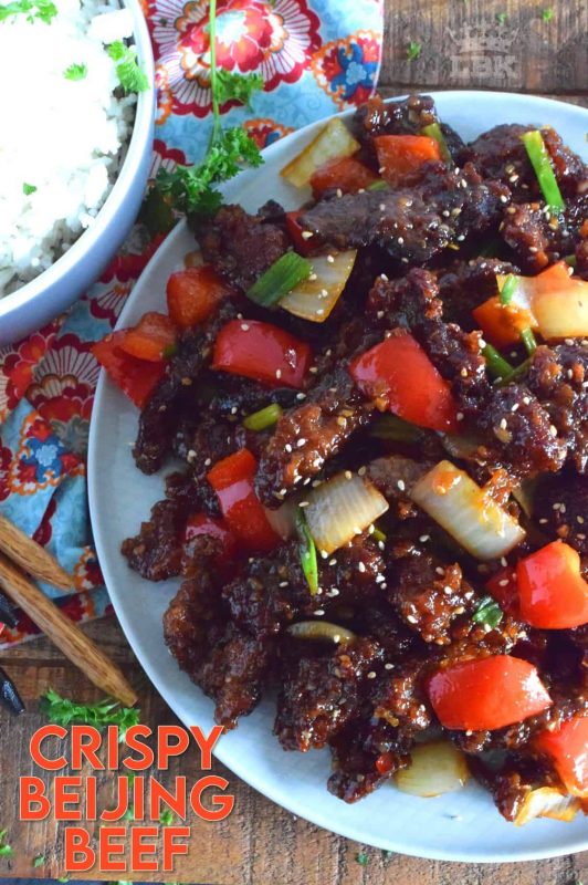 Tender strips of beef, which has been fried until crispy, and then tossed in a sweet, spicy sauce, is what Crispy Beijing Beef is all about! Prepared with onions and peppers, serve with sticky rice for a complete meal! #crispy #friedbeef #beijingbeef #asianbeef #chinesefood #homemadechinesefood #beef