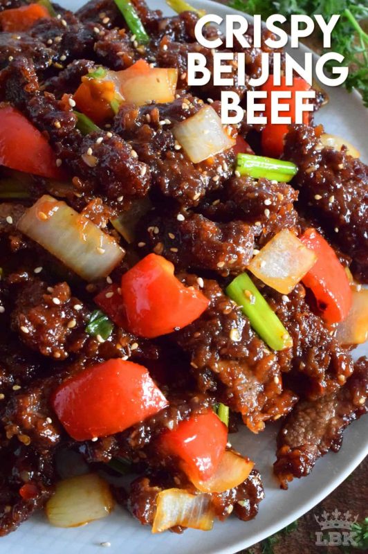 Tender strips of beef, which has been fried until crispy, and then tossed in a sweet, spicy sauce, is what Crispy Beijing Beef is all about! Prepared with onions and peppers, serve with sticky rice for a complete meal! #crispy #friedbeef #beijingbeef #asianbeef #chinesefood #homemadechinesefood #beef