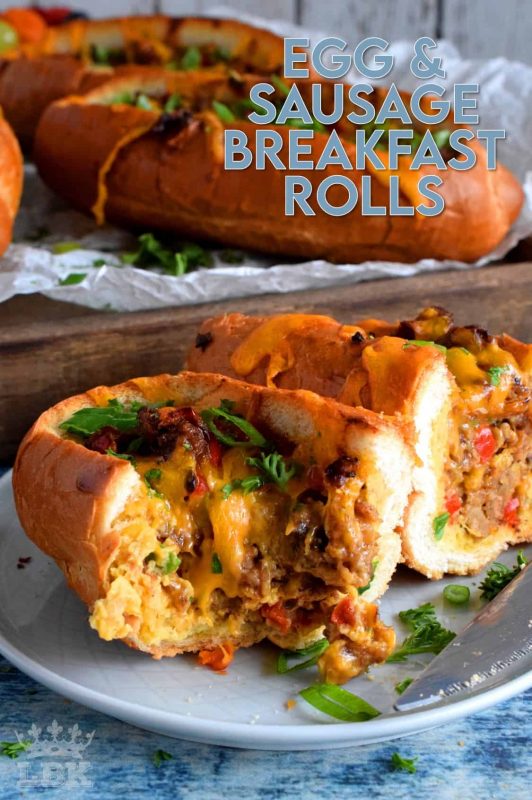 This dish has everything a good traditional breakfast needs - eggs, meat, and bread. Egg and Sausage Breakfast Rolls are delicious, easy, and fun too! It's as simple as hollowing out rolls, filling them with egg, sausage, and cheese, before baking them until the cheese is melted and bubbly. Sounds delicious, right? #sausage #sausageandegg #breakfast #sausagerolls #brunch