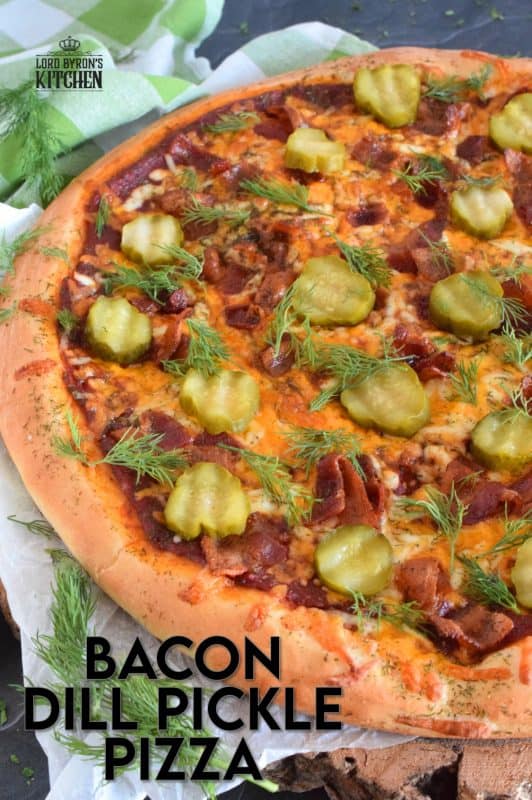 If you love a strong dill presence, you are going to devour this Bacon Dill Pickle Pizza! Prepared with a dill flavoured crust, and topped with fresh dill and dill pickles, this pizza is a dill lovers dream and then some! #dillpickle #bacon #pizza #homemadepizza #dillpicklepizza