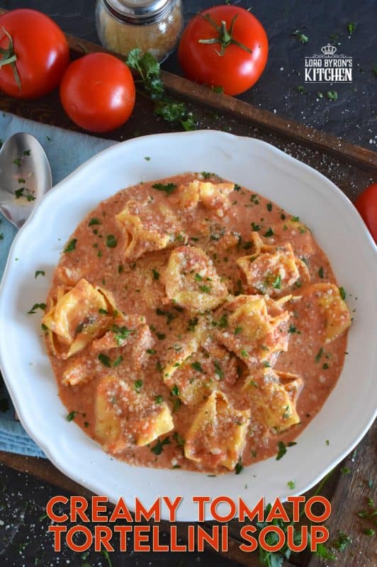 A quick and easy, hearty and cozy dinner, prepared with ready-made ingredients. Creamy Tomato Tortellini Soup is made with canned tomato soup, frozen pasta, and cream cheese. It is the ultimate cold-weather, family-friendly meal! #creamy #tortellini #tomatosoup #soupwithpasta #creamcheese #familyrecipes #meatlessmonday