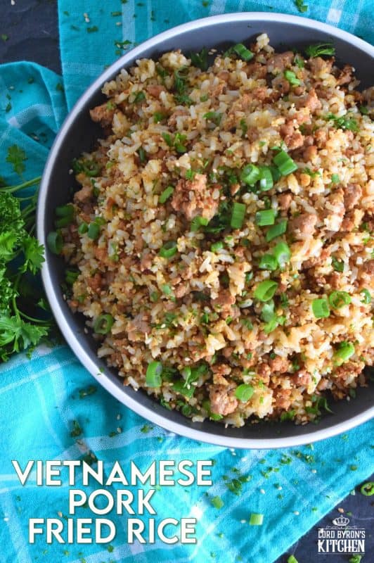 Leftover rice and ground pork are the main ingredients in Vietnamese Pork Fried Rice. Prepared with eggs, garlic, ginger, and green onions, and seasoned with fish sauce, this rice is a complete meal all on its own! #friedrice #pork #vietnameserecipes #porkfriedrice #skillet