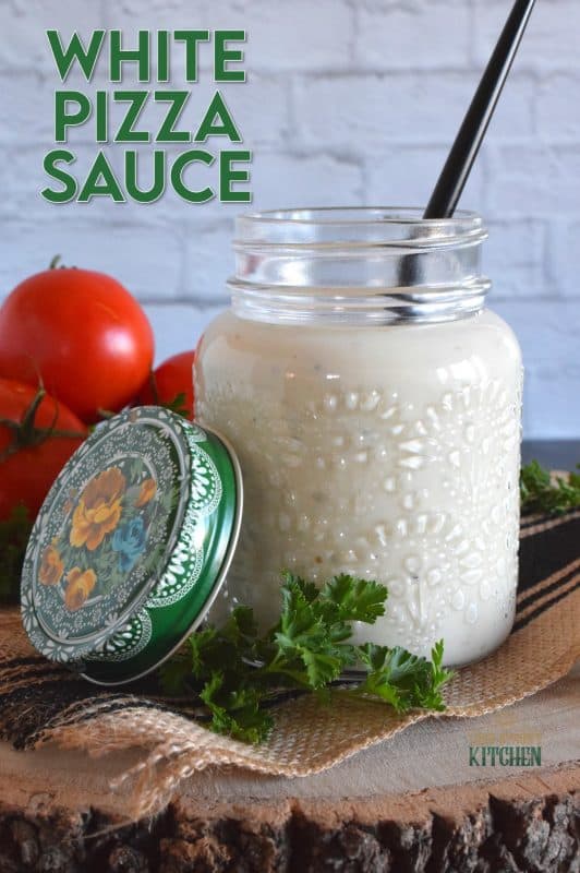Looking to switch up your homemade pizza? Try switching out the tomato sauce for this White Pizza Sauce! Prepared with lots of garlic, cream, and parmesan, you might want to skip the toppings completely! #pizza #pizzasauce #whitepizza #whitepizzasauce #garlicsauce